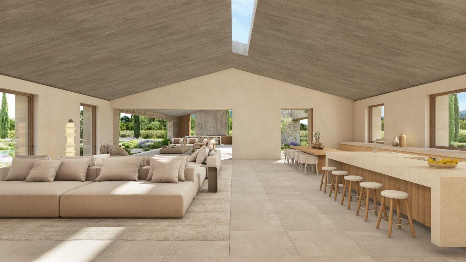 Salón y cocina de concepto abierto con isla bajo un techo inclinado de madera