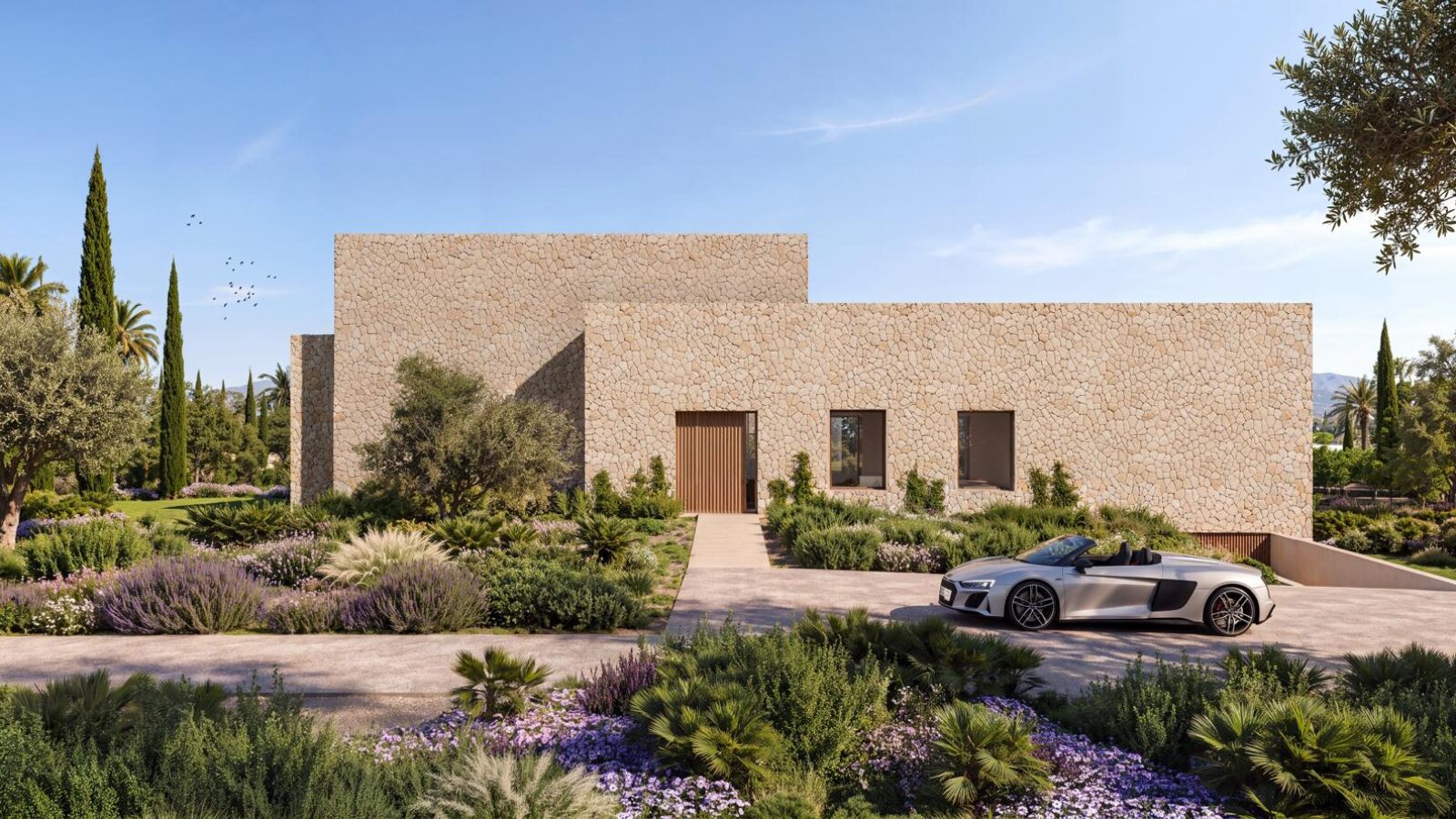 Main entrance to the finca with a landscaped drive