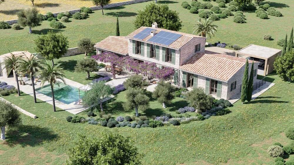 Aerial view of Na Conta: stone house with tiled roof, solar panels and swimming pool