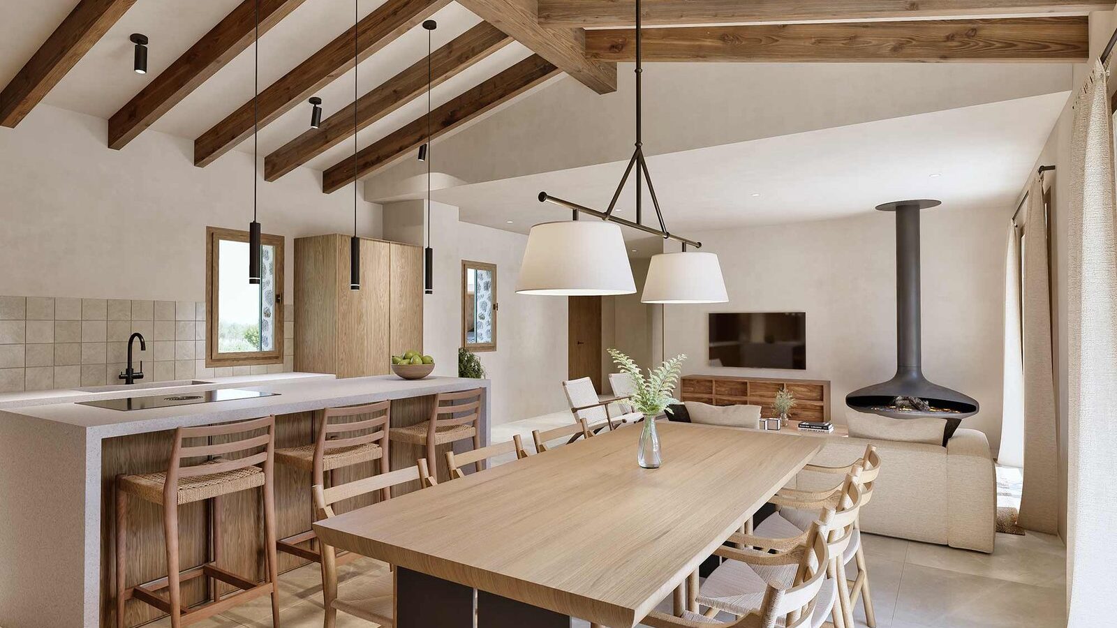 Open kitchen with a light island, wooden stools, dining table, hanging fireplace and exposed beams