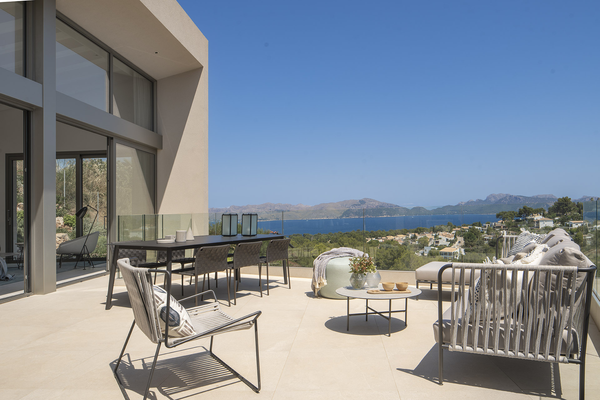 Terrace with outdoor dining area overlooking the bay in Mallorca